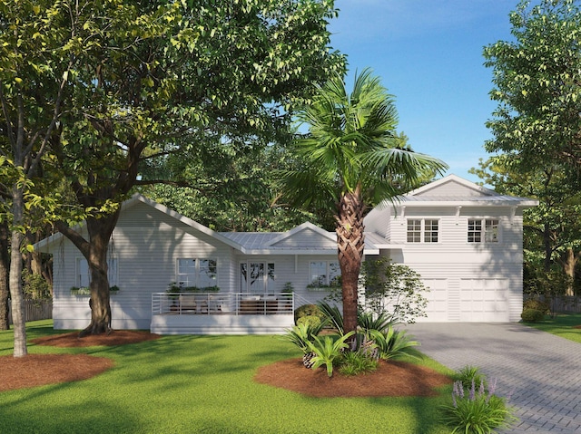 ranch-style house featuring a porch, a garage, and a front lawn