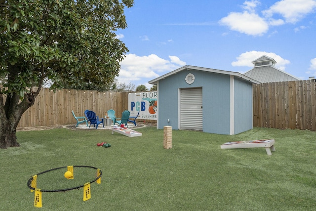 view of outbuilding featuring a yard