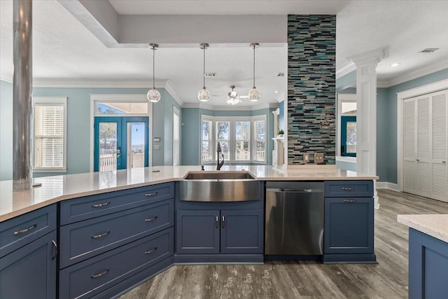 14138 State Highway 20, Niceville, FL 32578 - kitchen with stainless steel dishwasher, crown molding, wood finished floors, ceiling fan, and light countertops