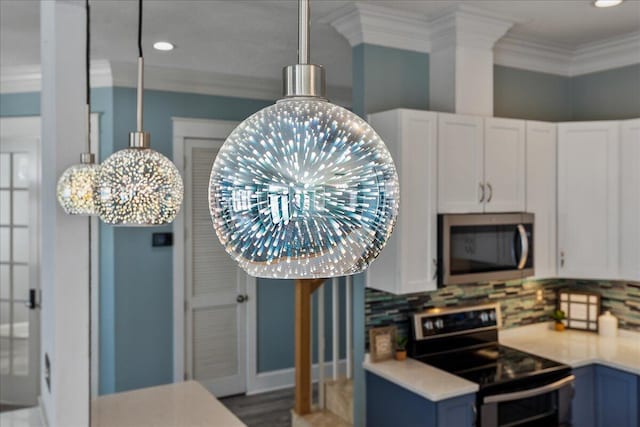 14138 State Highway 20, Niceville, FL 32578 - kitchen featuring stainless steel appliances, crown molding, light countertops, backsplash, and blue cabinetry