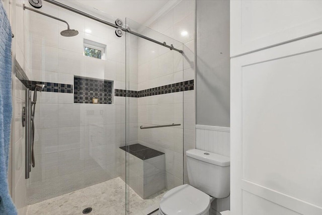 bathroom with toilet and walk in shower