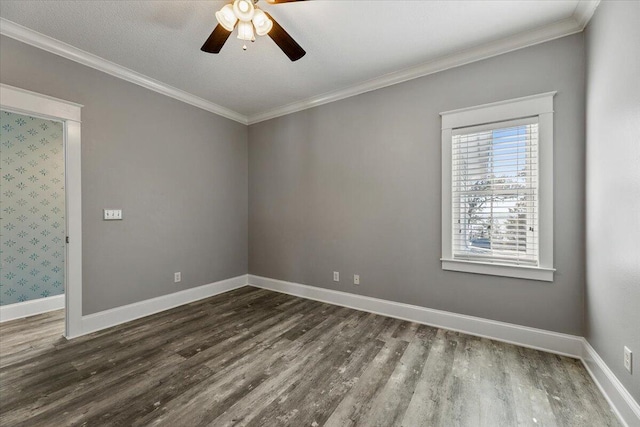 spare room with hardwood / wood-style floors, ceiling fan, and crown molding