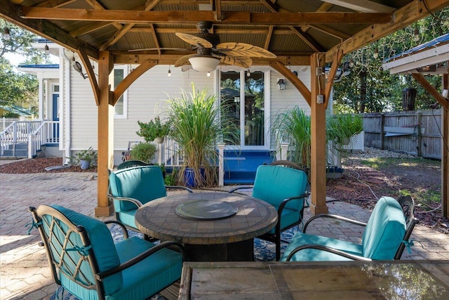 view of patio with a gazebo and ceiling fan