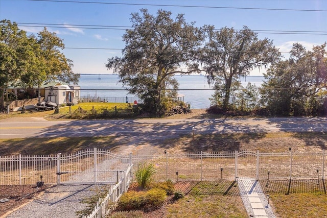 view of yard with a water view