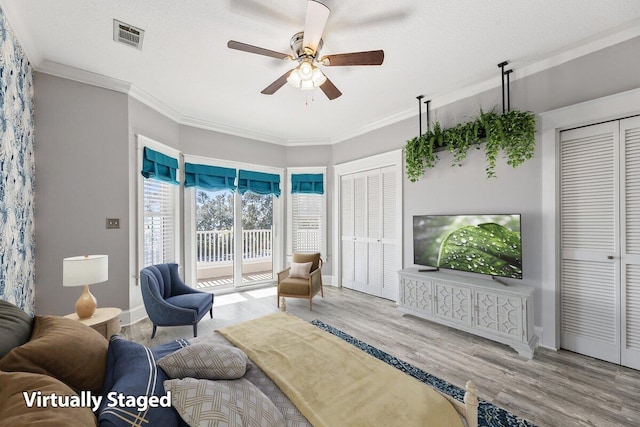 14138 State Highway 20, Niceville, FL 32578 - living room with ceiling fan, wood finished floors, and crown molding
