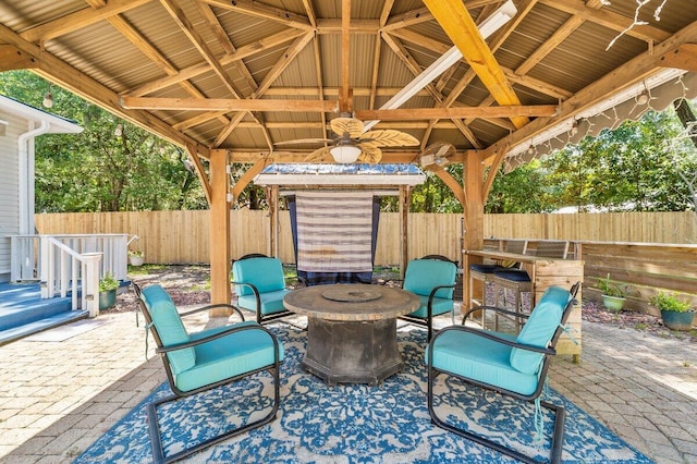 14138 State Highway 20, Niceville, FL 32578 - fenced backyard with a gazebo, an outdoor fire pit, and a patio area