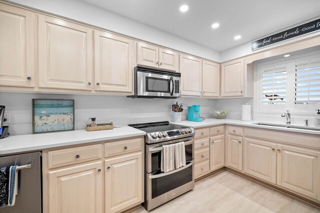 kitchen with sink and stainless steel appliances