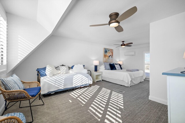 carpeted bedroom with a wall mounted air conditioner, ceiling fan, and lofted ceiling