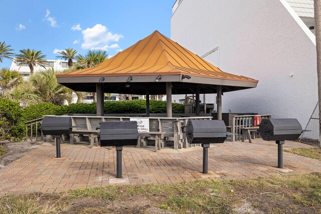 view of community with a gazebo and a patio area