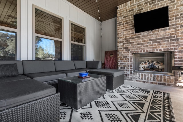 view of patio / terrace featuring an outdoor living space with a fireplace