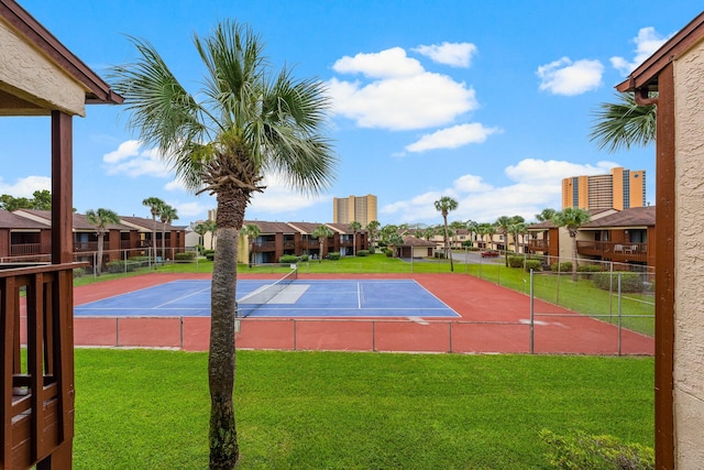 view of basketball court featuring a yard and tennis court