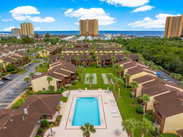 17751 Panama City Beach Pkwy Unit 13E, Panama City Beach, FL 32413 - aerial perspective of suburban area with a pool and a nearby body of water