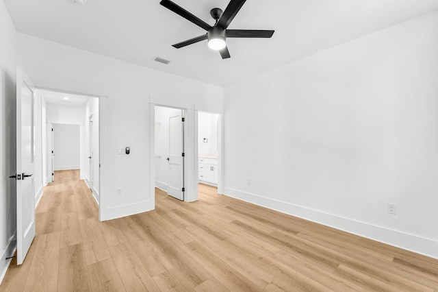 unfurnished bedroom with ceiling fan and light hardwood / wood-style floors