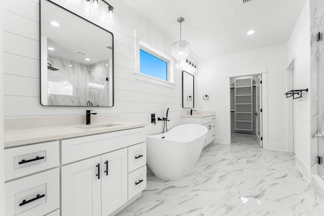 bathroom featuring wood walls, vanity, separate shower and tub, and a chandelier