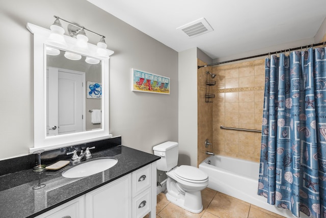 full bathroom featuring tile patterned flooring, vanity, shower / bath combo, and toilet