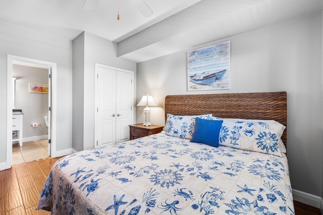 bedroom featuring a closet, ceiling fan, and hardwood / wood-style flooring