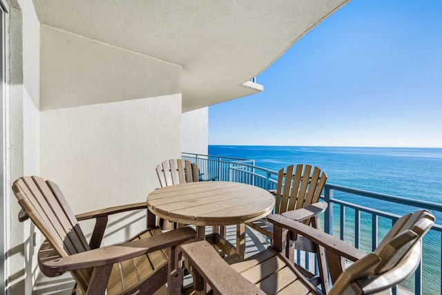 balcony featuring a water view