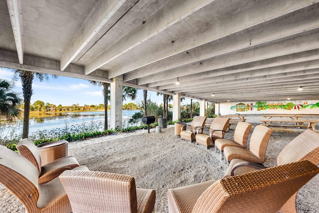 view of patio / terrace with a water view