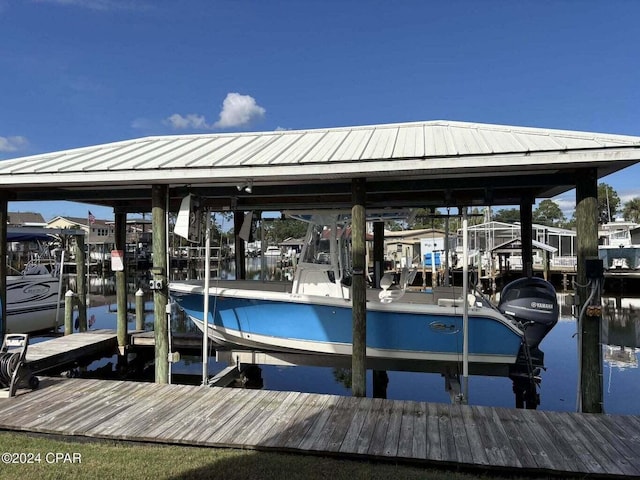 view of dock with a water view