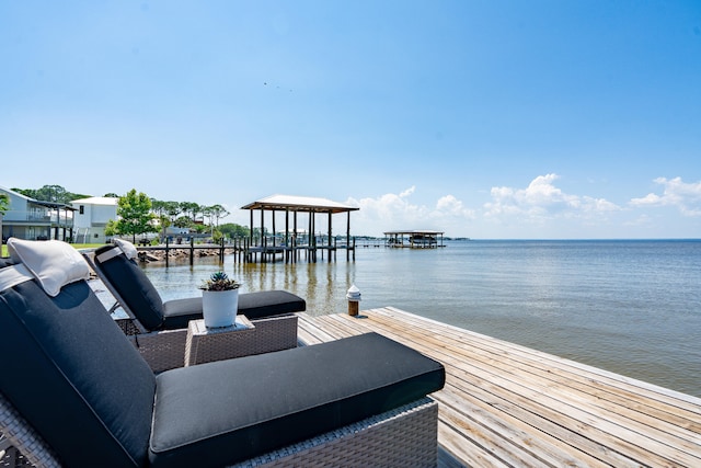 dock area featuring a water view