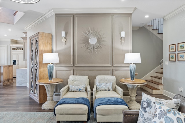 interior space featuring dark hardwood / wood-style flooring, crown molding, and a skylight