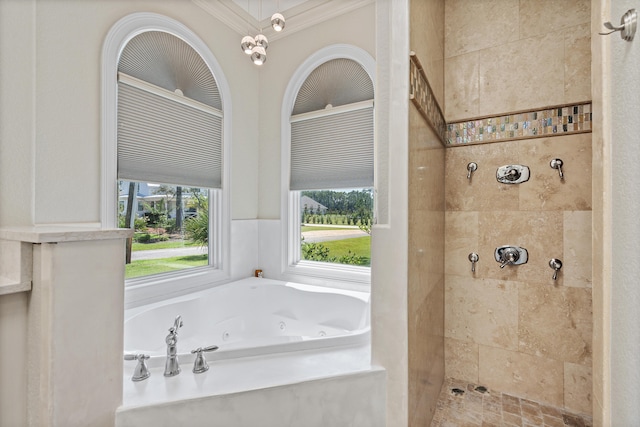 bathroom with independent shower and bath and ornamental molding