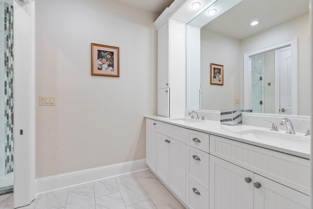 bathroom with vanity and walk in shower