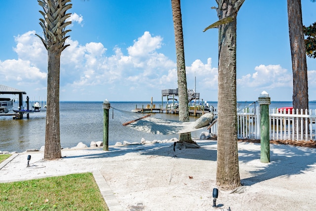 view of dock with a water view