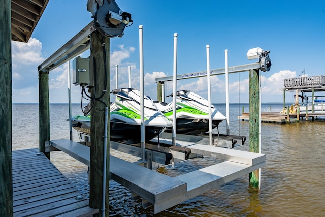 view of dock with a water view