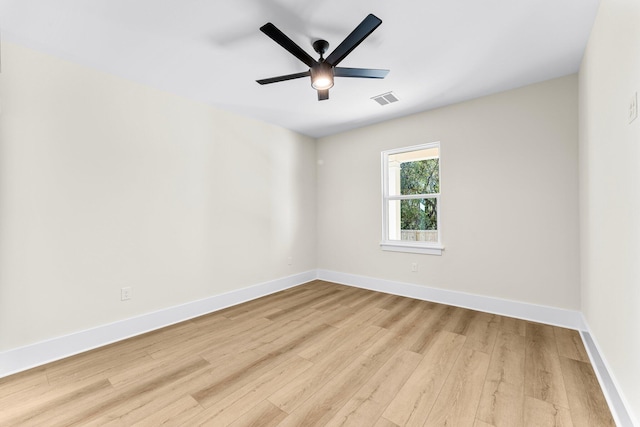 unfurnished room featuring ceiling fan and light hardwood / wood-style flooring