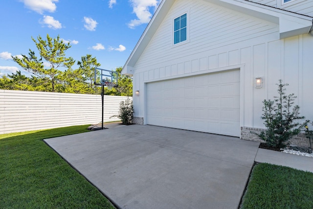 garage with a lawn