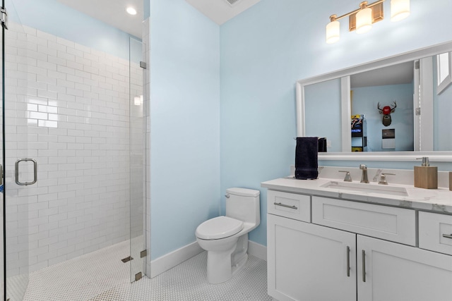 bathroom with toilet, vanity, tile patterned floors, and an enclosed shower