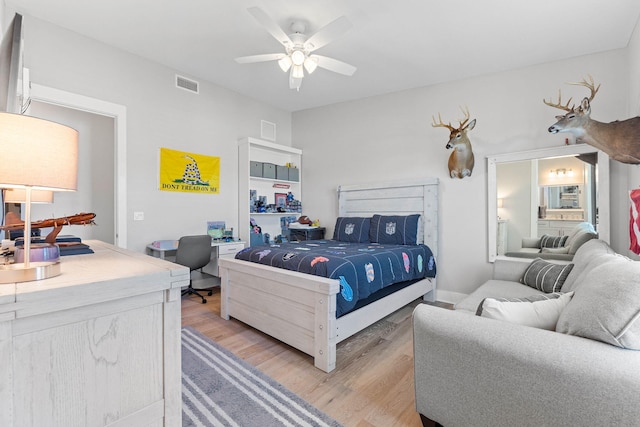 bedroom featuring ceiling fan and light hardwood / wood-style flooring