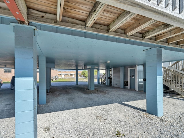 view of parking with a carport