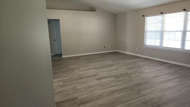 spare room featuring light hardwood / wood-style flooring