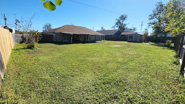 view of yard with a storage shed