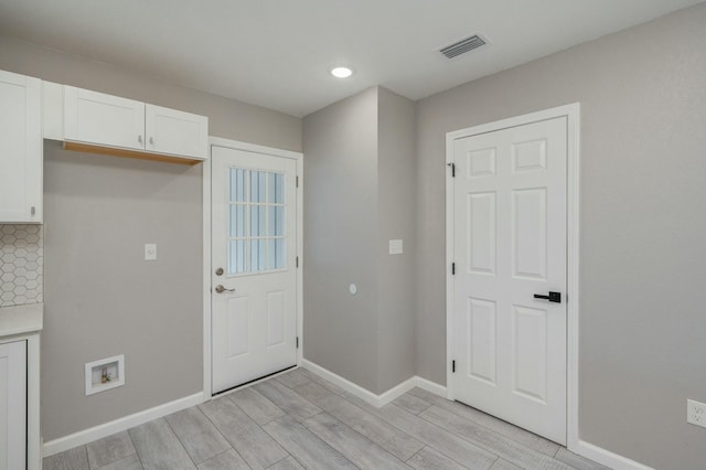 interior space with light hardwood / wood-style floors