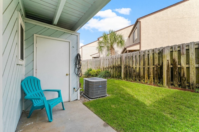 view of yard with central AC