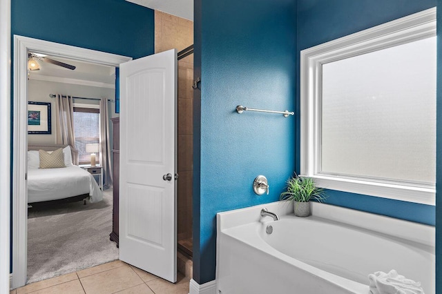 bathroom with separate shower and tub, tile patterned floors, and ceiling fan