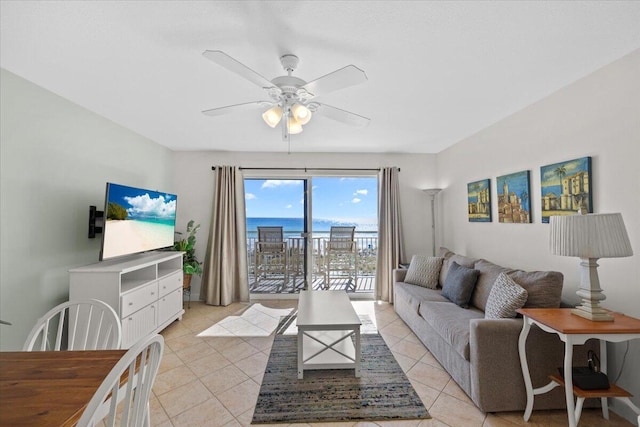 living room with light tile patterned floors and ceiling fan