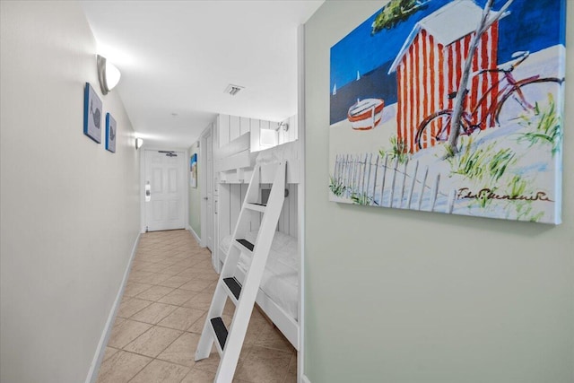 hall featuring tile patterned floors