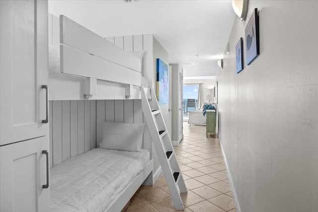 bedroom with light tile patterned flooring