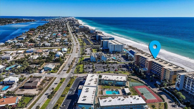 aerial view featuring a view of the beach and a water view