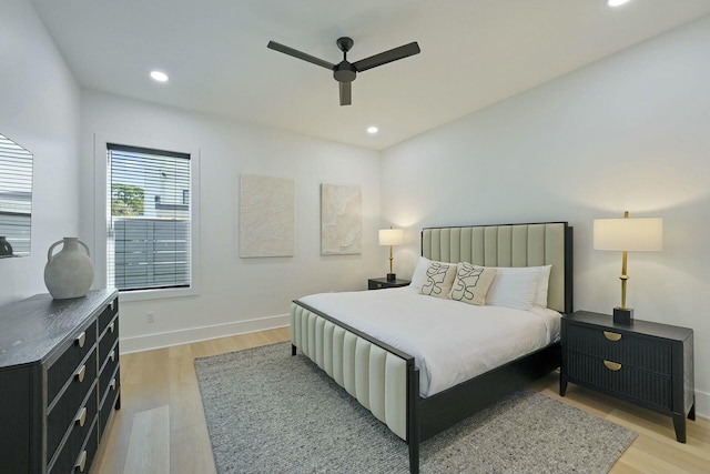 bedroom featuring ceiling fan and light wood-type flooring