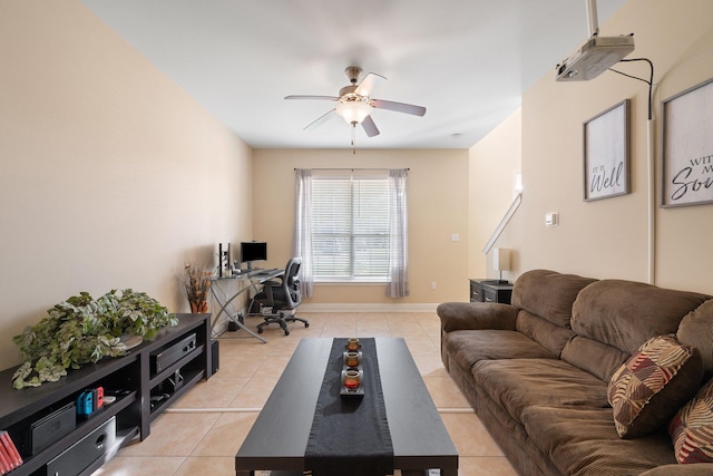 living room with ceiling fan and light tile patterned flooring