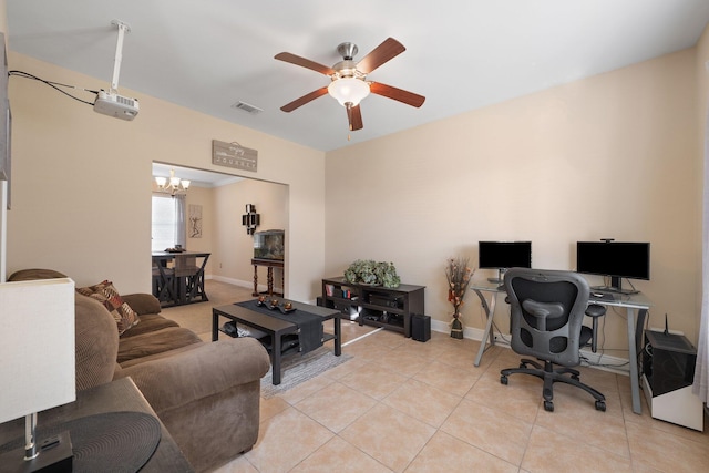 tiled office with ceiling fan with notable chandelier