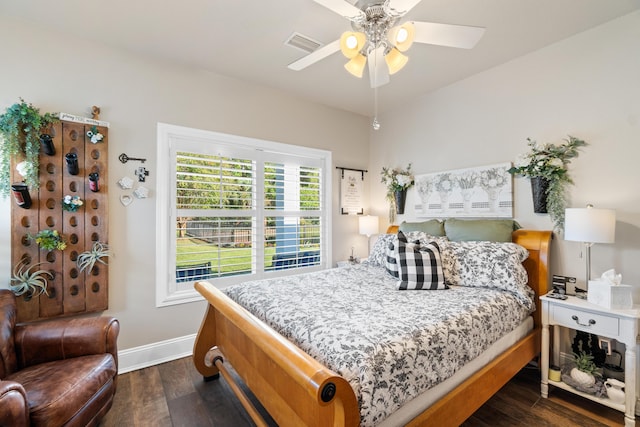 bedroom featuring ceiling fan and dark hardwood / wood-style floors