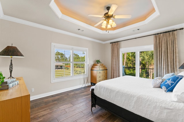 bedroom with dark hardwood / wood-style flooring, multiple windows, ornamental molding, and ceiling fan