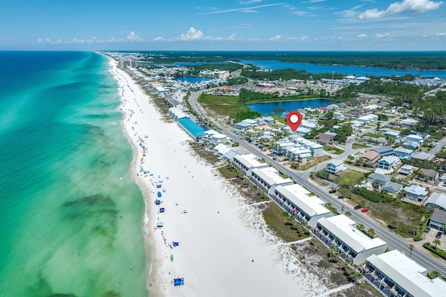 aerial view with a beach view and a water view