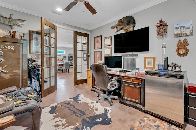 office featuring french doors, light hardwood / wood-style floors, ceiling fan, and crown molding